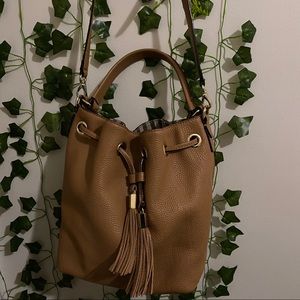 brown tasseled handle and strap bag (used twice)